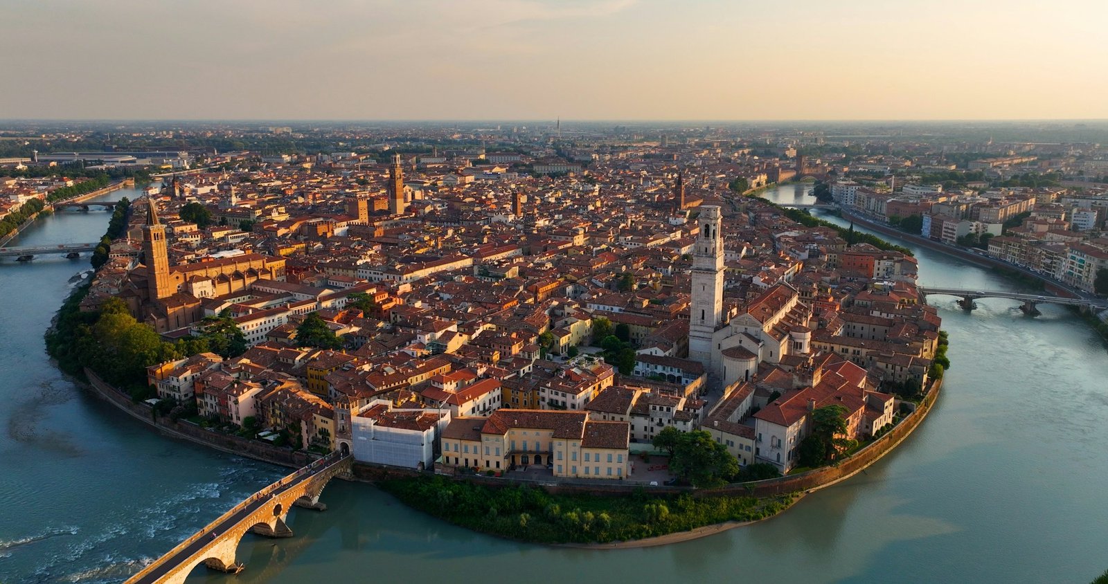 Verona skyline, aerial view of historical city centre, red tiled roofs, Italy