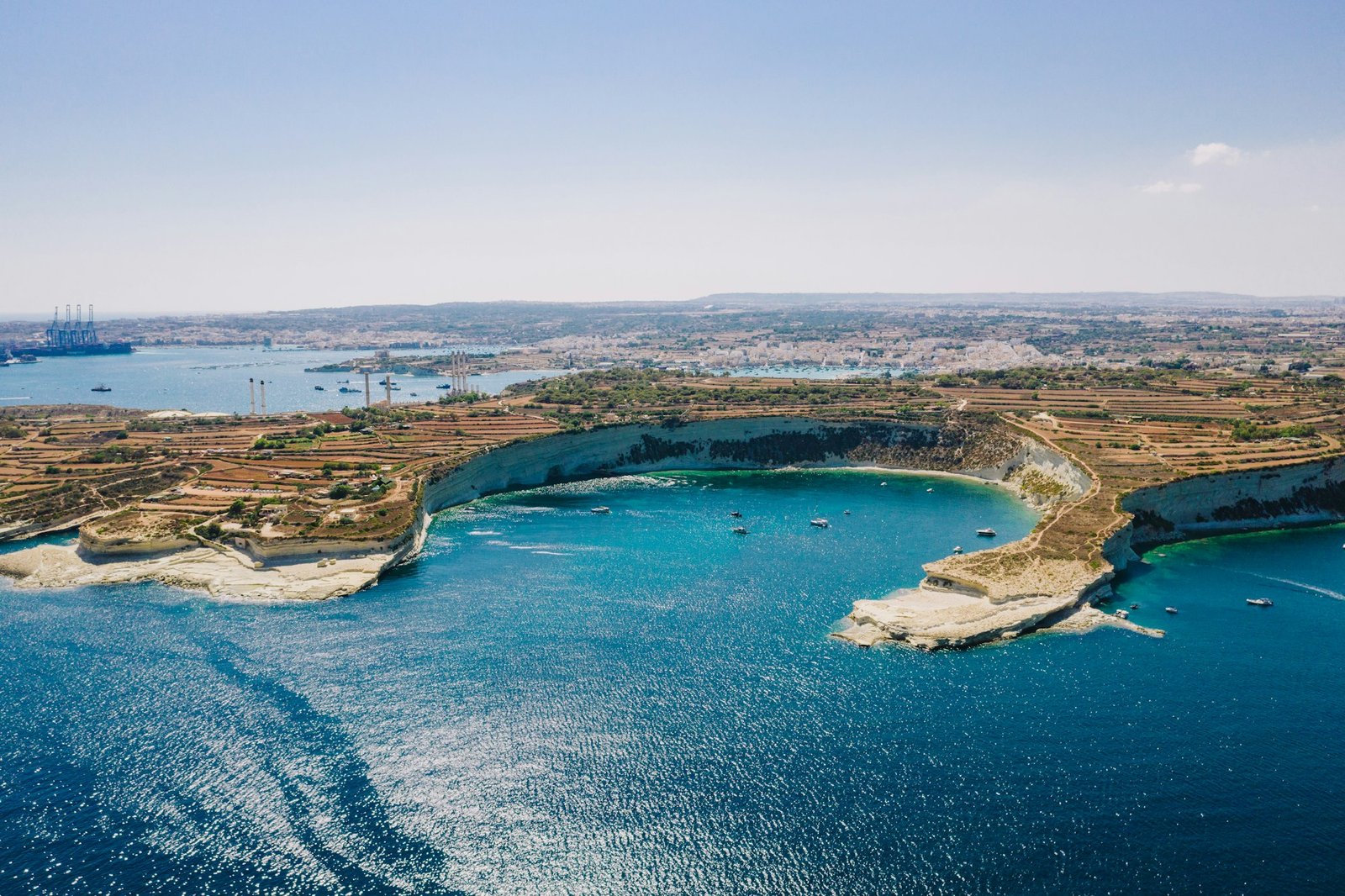Aerial view of Il-Ħofra ż-Żgħira bay in Malta