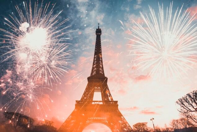 Eiffel tower (Paris, France) with fireworks - Celebrating New Year in the city