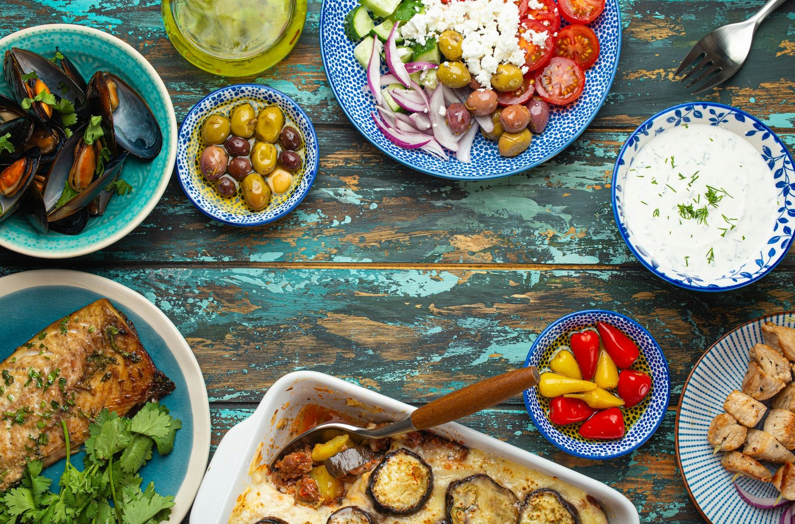 Greek food dishes assorted from above copy space