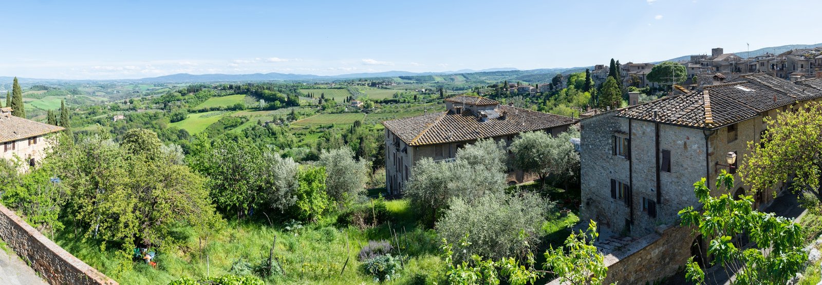 Panoramic beautiful rural landscape of Toscana. Green fields and meadows