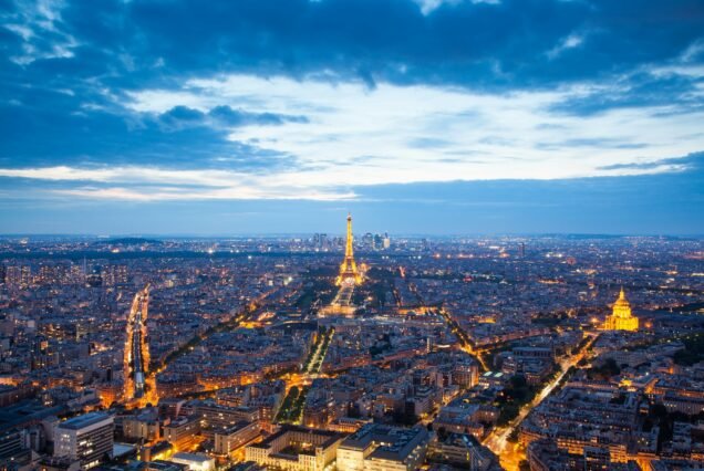 skyline of Paris with Eiffel Tower at sunset in Paris, France