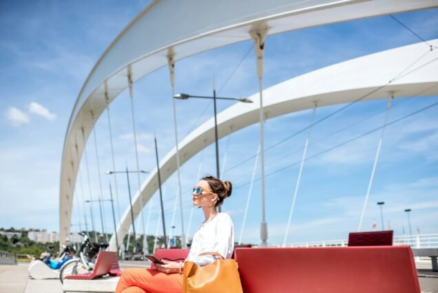 Woman on the modern bridge in Lyon