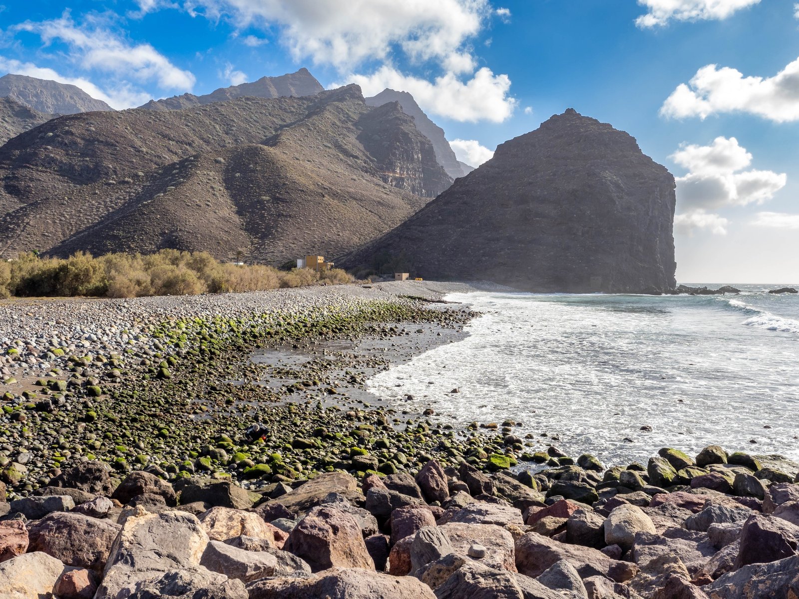 Beach of pebbles of La Aldea in Gran Canaria Island, Canary Islands, Spain