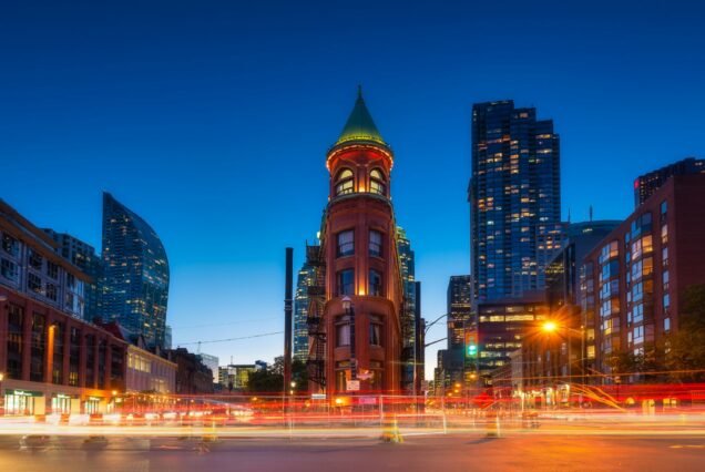 Canada, Toronto. The famous Gooderham building and the skyscrapers in the background.