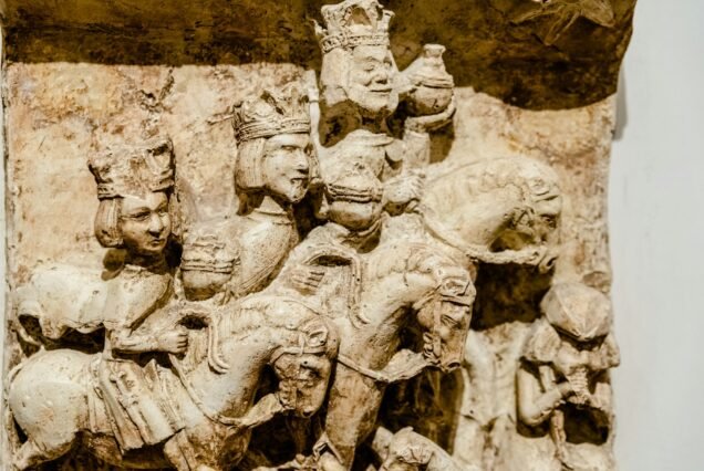 Detail of religious sculptures carved in medieval stone in the castle of Bari