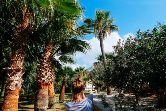 Girl amongst Palm Trees in Cyprus