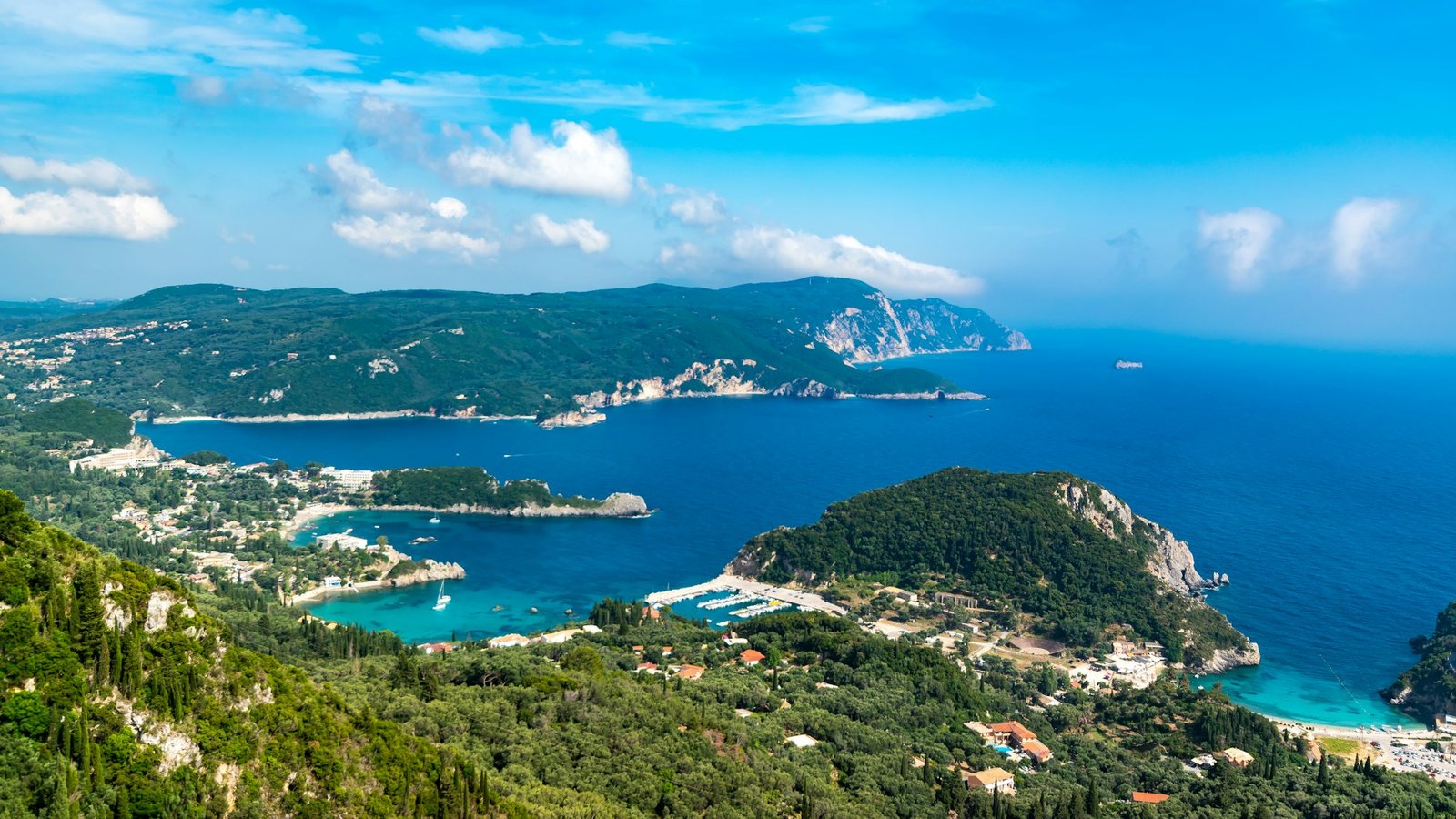Landscape of the Bay of Palaiokastritsa surrounded by the sea in Corfu, Greece