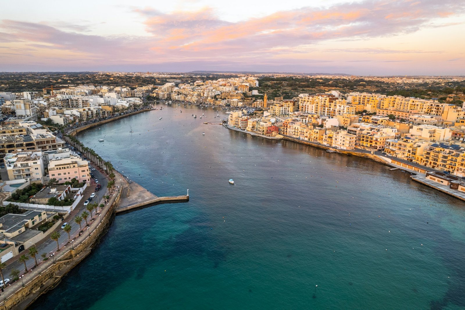Marsaskala fisherman village in Malta, aerial drone view