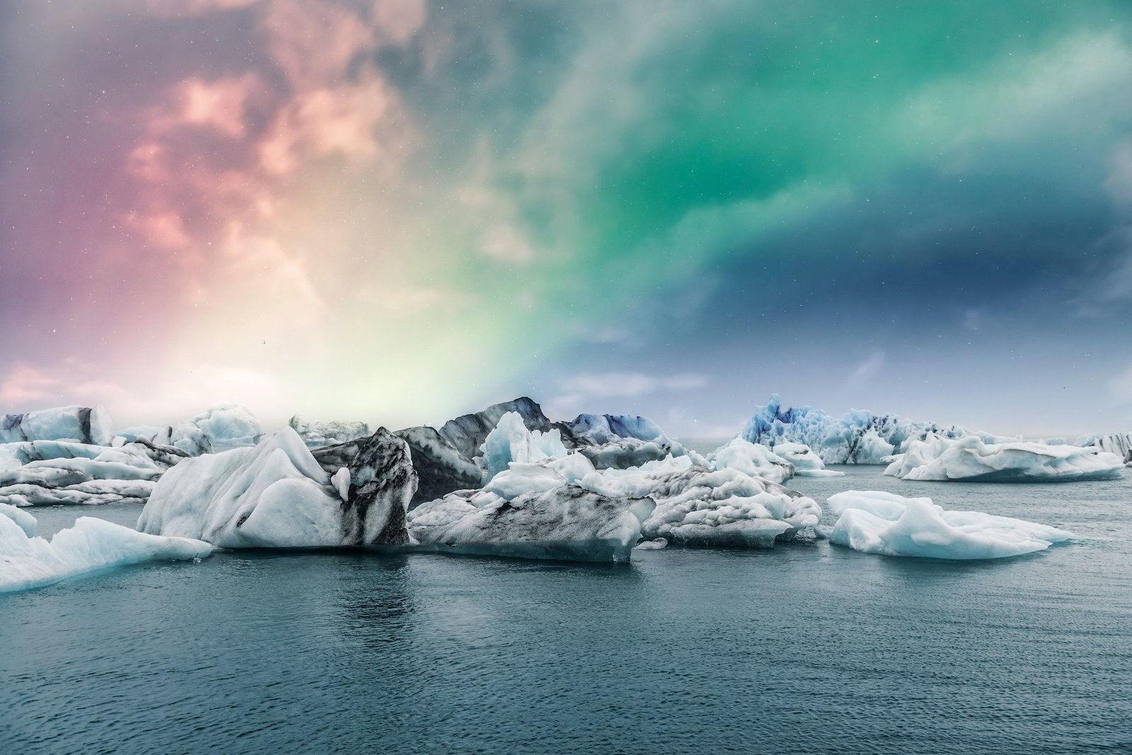 Northern lights aurora borealis over Jokulsarlon glacier ice lagoon in Iceland