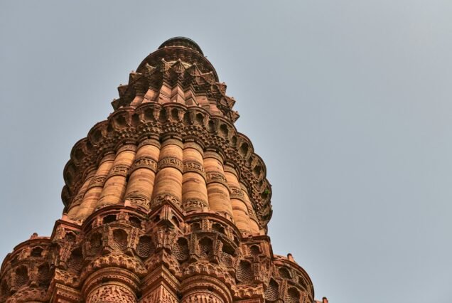 Qutb Minar minaret tower part Qutb complex in South Delhi, India, big red sandstone minaret tower