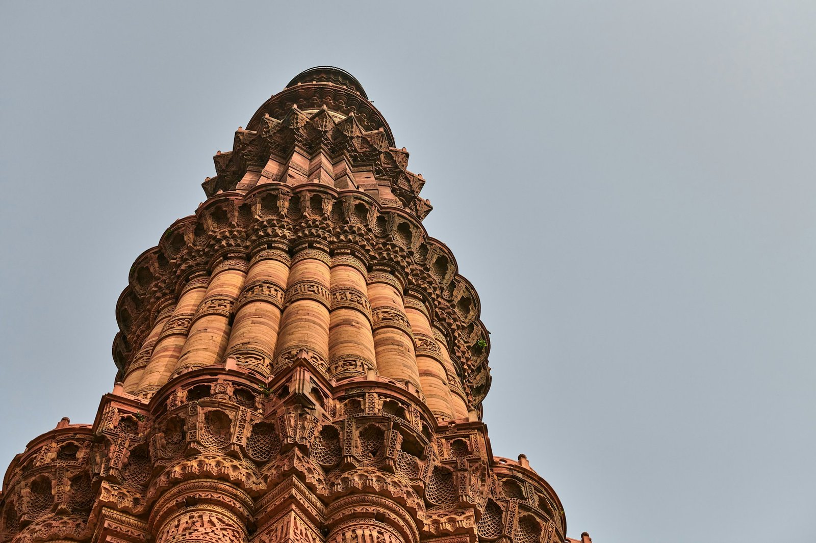 Qutb Minar minaret tower part Qutb complex in South Delhi, India, big red sandstone minaret tower
