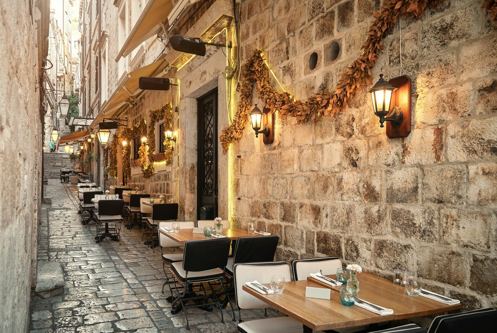 Restaurant in a narrow street in the old town of Dubrovnik, Croatia.