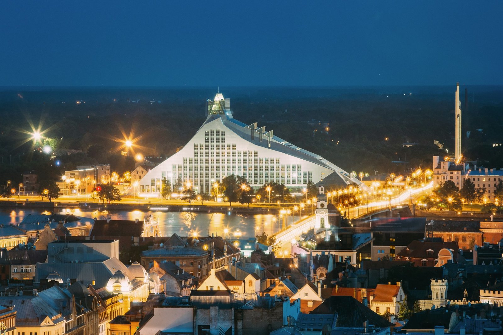 Riga, Latvia. Aerial View Of Cityscape In Summer Evening Or Nigh