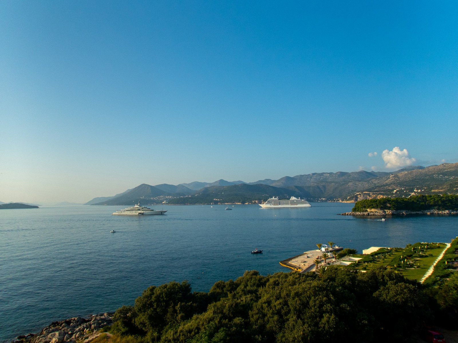 Two cruise ships in front of the coastline in Dubrovnik