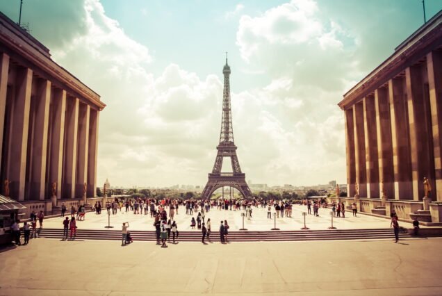 The Eiffel Tower In Paris France is a popular tourist attraction with Parisian culture and style