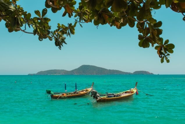 Fishing boats on the coast of the sea in Thailand on the island of Phuket